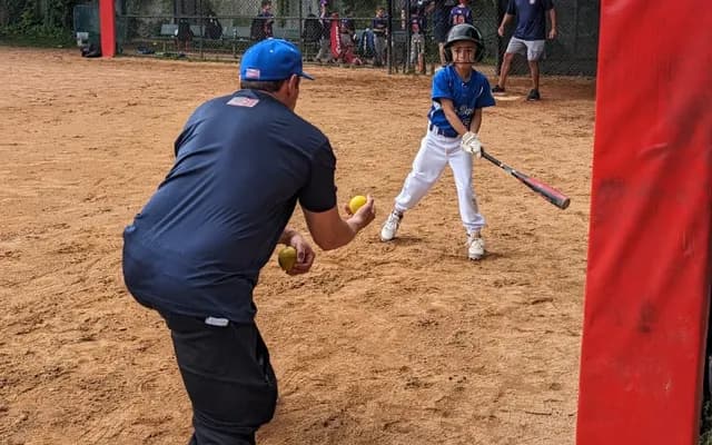 Biagio Maffettone playing with Eastchester little league player